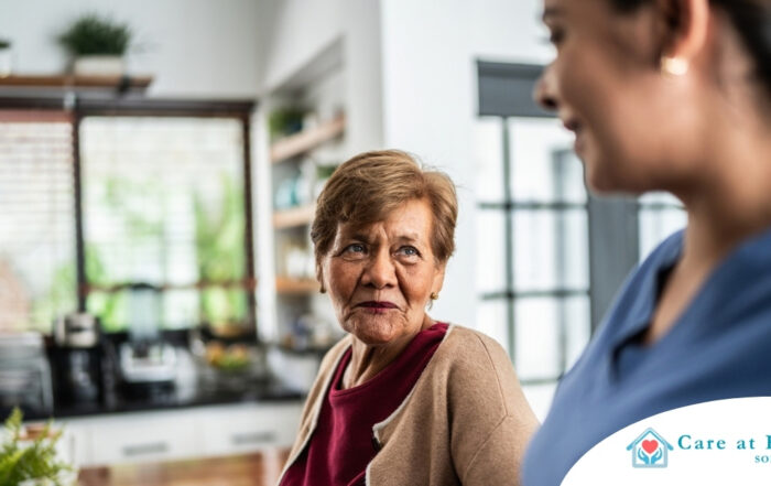 Caregiver provides attentive senior care as part of diabetes awareness